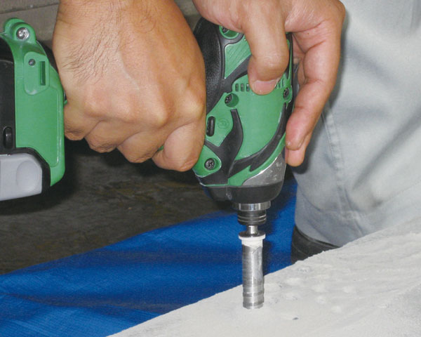 Image of using a cordless impact driver